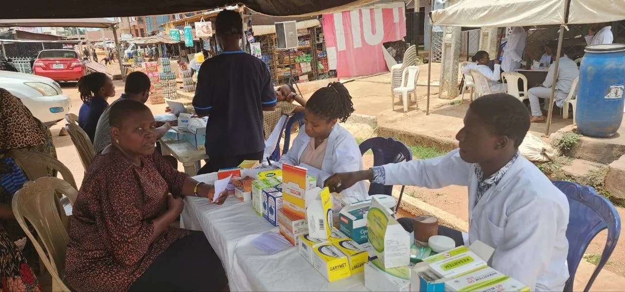 A pharmacist dispensing medicines during a consultation