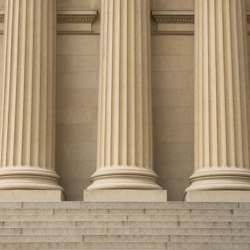 Classical stone bank facade with columns and steps